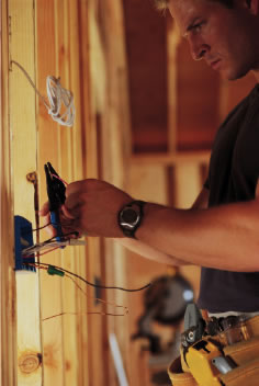 Electrician installing wiring